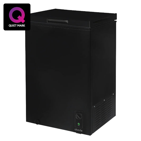 A black obode brand top-freezer refrigerator with a control dial and green indicator light on the front lower corner, shown on a white background with a Quiet Mark badge in the top-left corner.