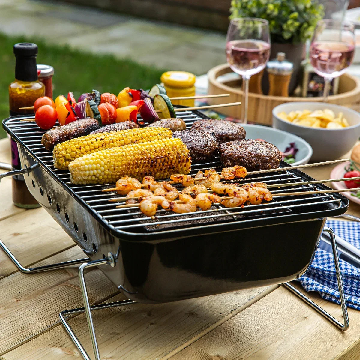 George Foreman GFPTBBQ1003B On-The-Go Portable Charcoal BBQ Black