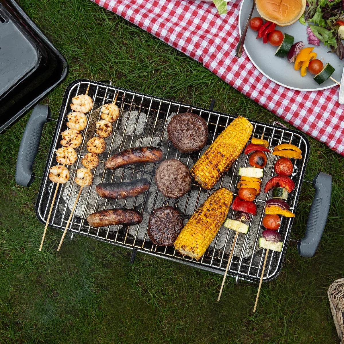 George Foreman GFPTBBQ1004B On-The-Go Portable Charcoal BBQ in Black