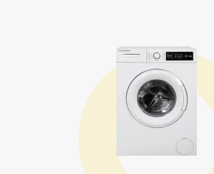 White washing machine on a light yellow background