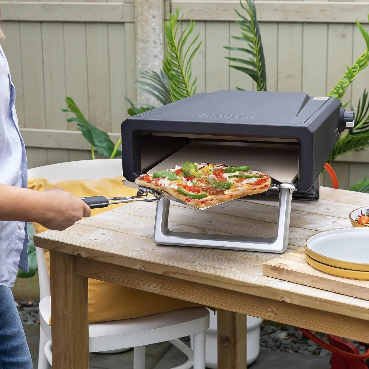Zanussi ZGPO1PC Gas Powered Pizza Oven with Paddle and Carry Bag in Black