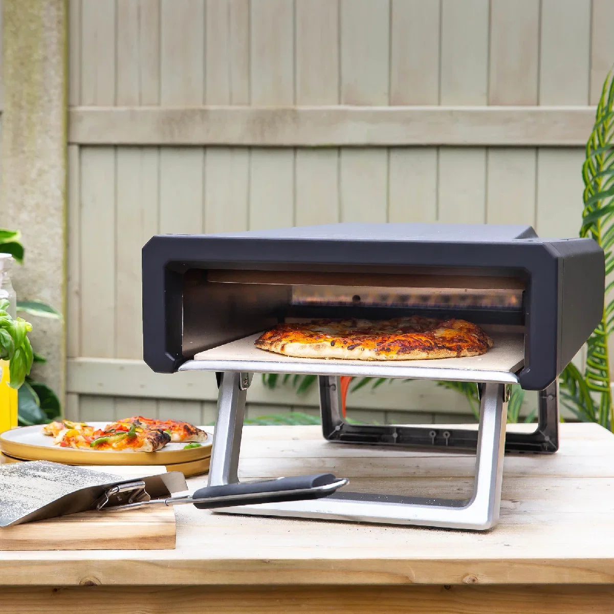 Zanussi ZGPO1PC Gas Powered Pizza Oven with Paddle and Carry Bag in Black